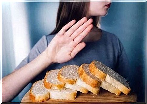 Woman rejecting gluten-free bread