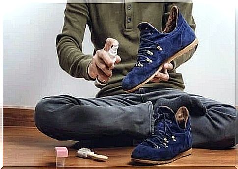 Man spraying shoes